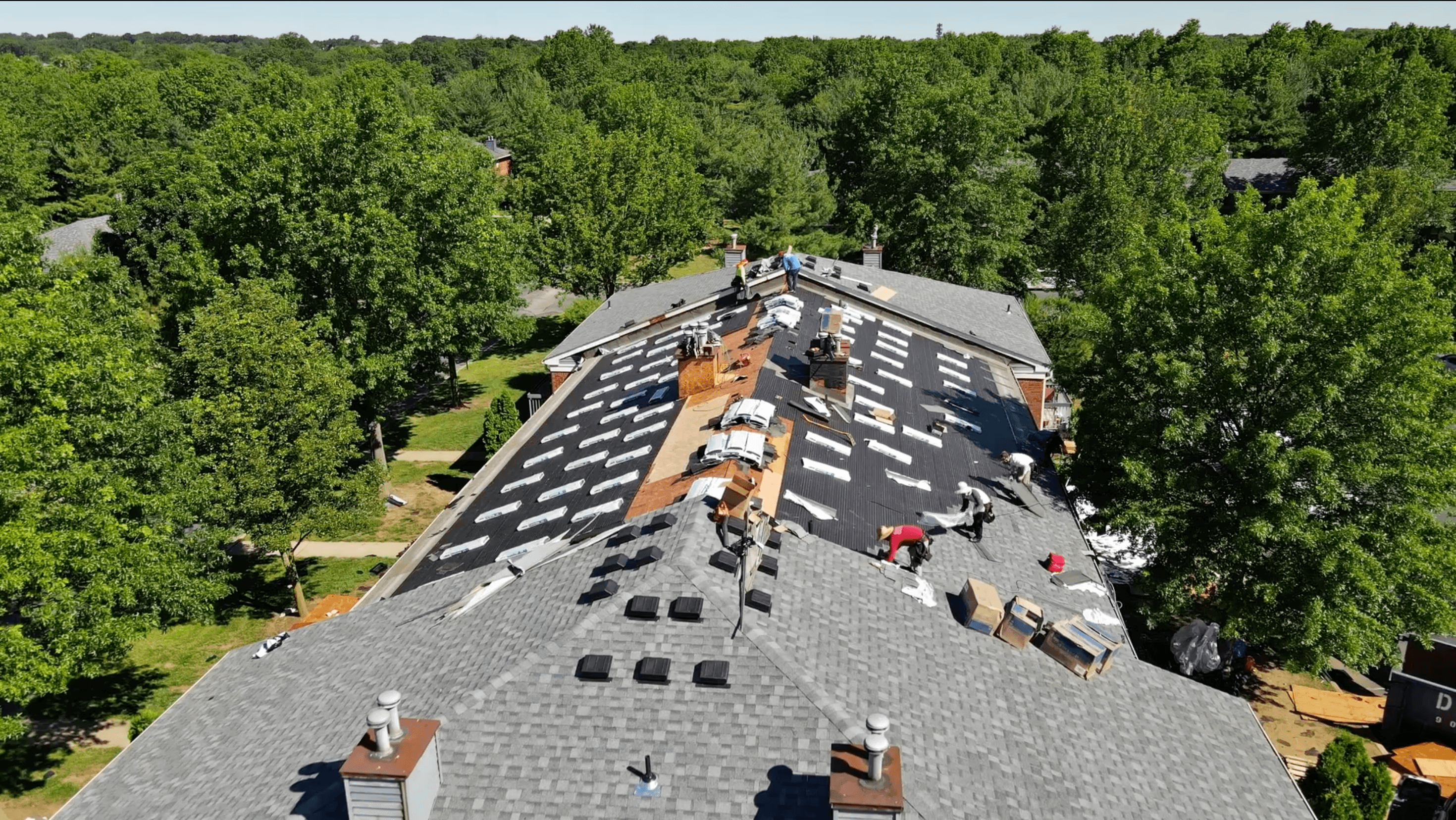 DUBCO roofing crew replacing commercial roofs.