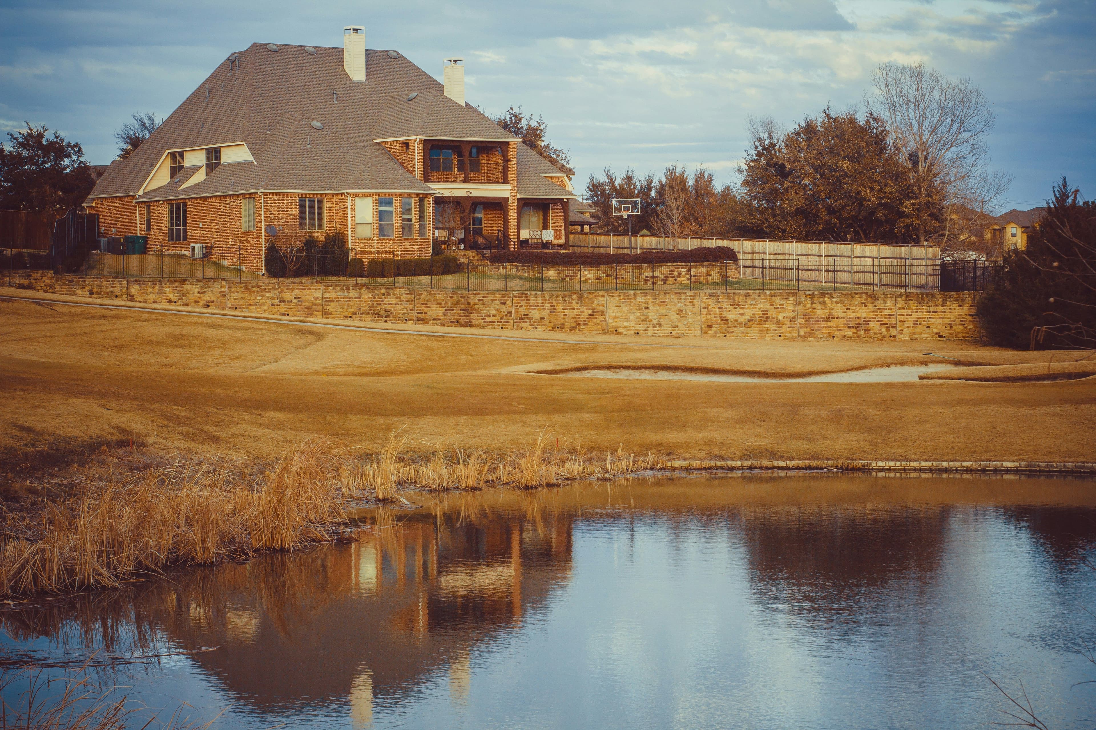 Residential home in Carrollton, Texas with a beautiful pond