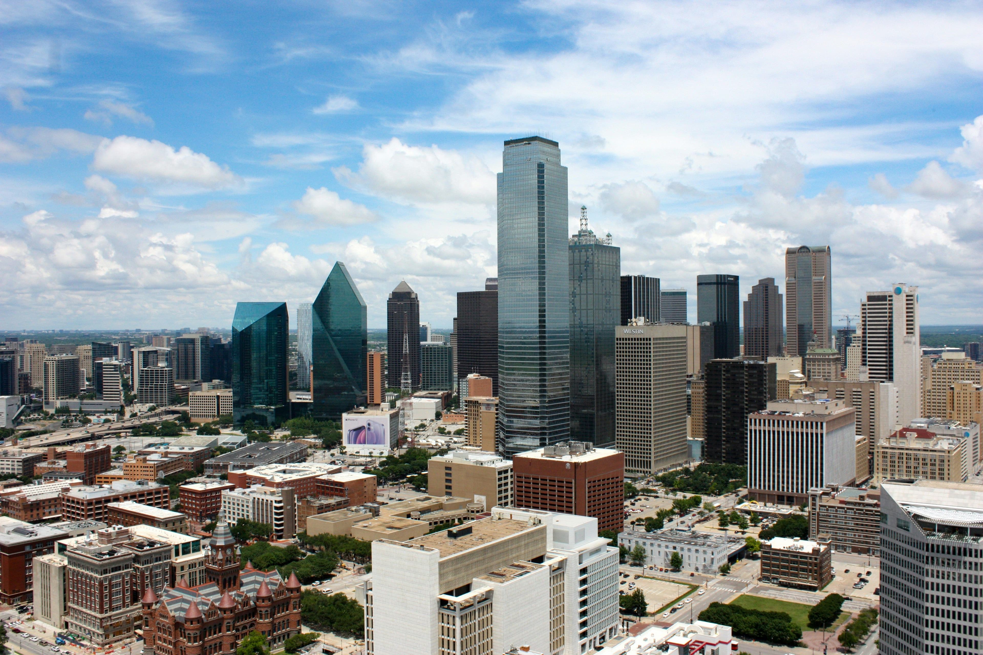 Downtown Dallas skyline with iconic skyscrapers on a sunny day