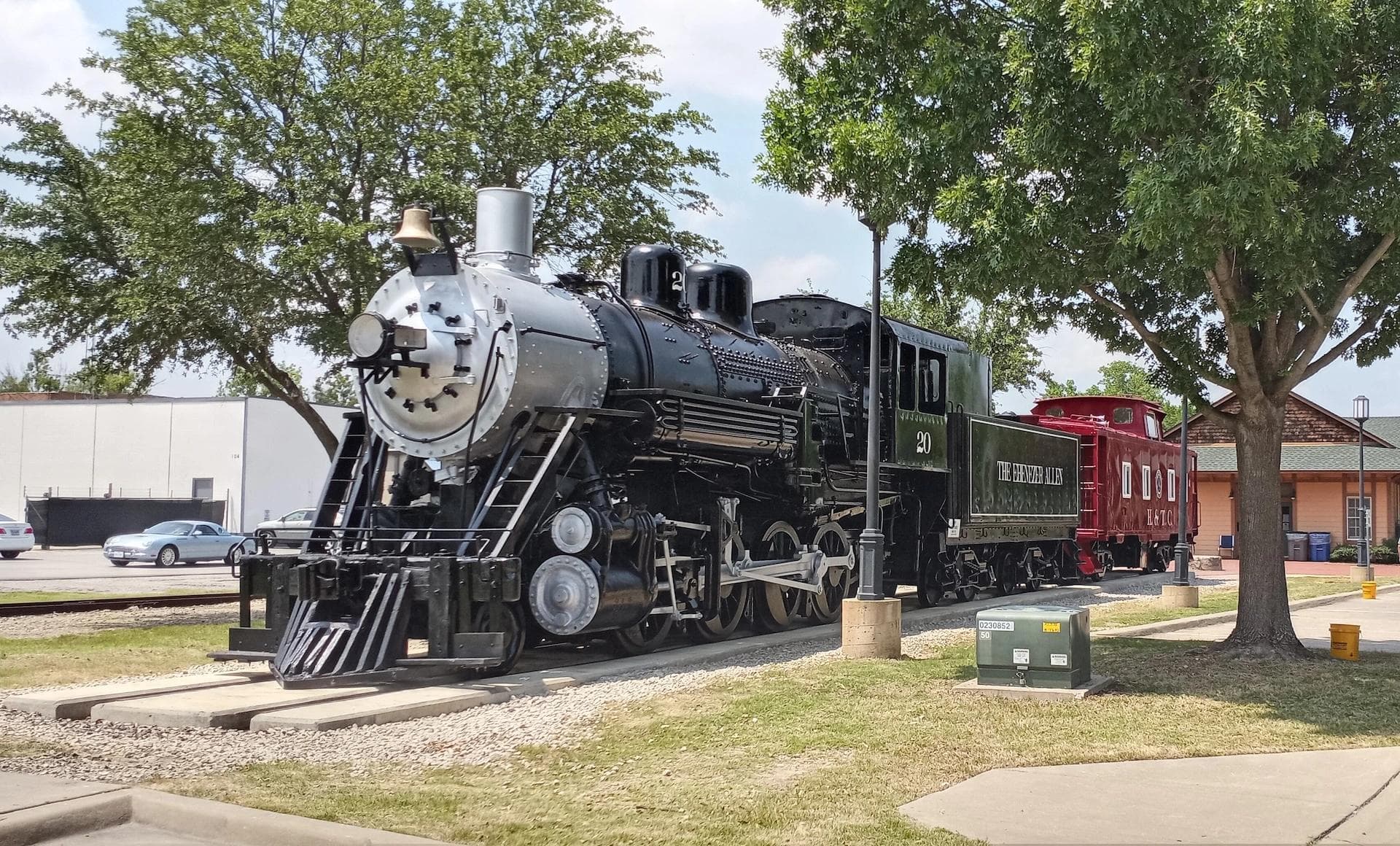 Historic black steam locomotive display in downtown Allen, Texas.