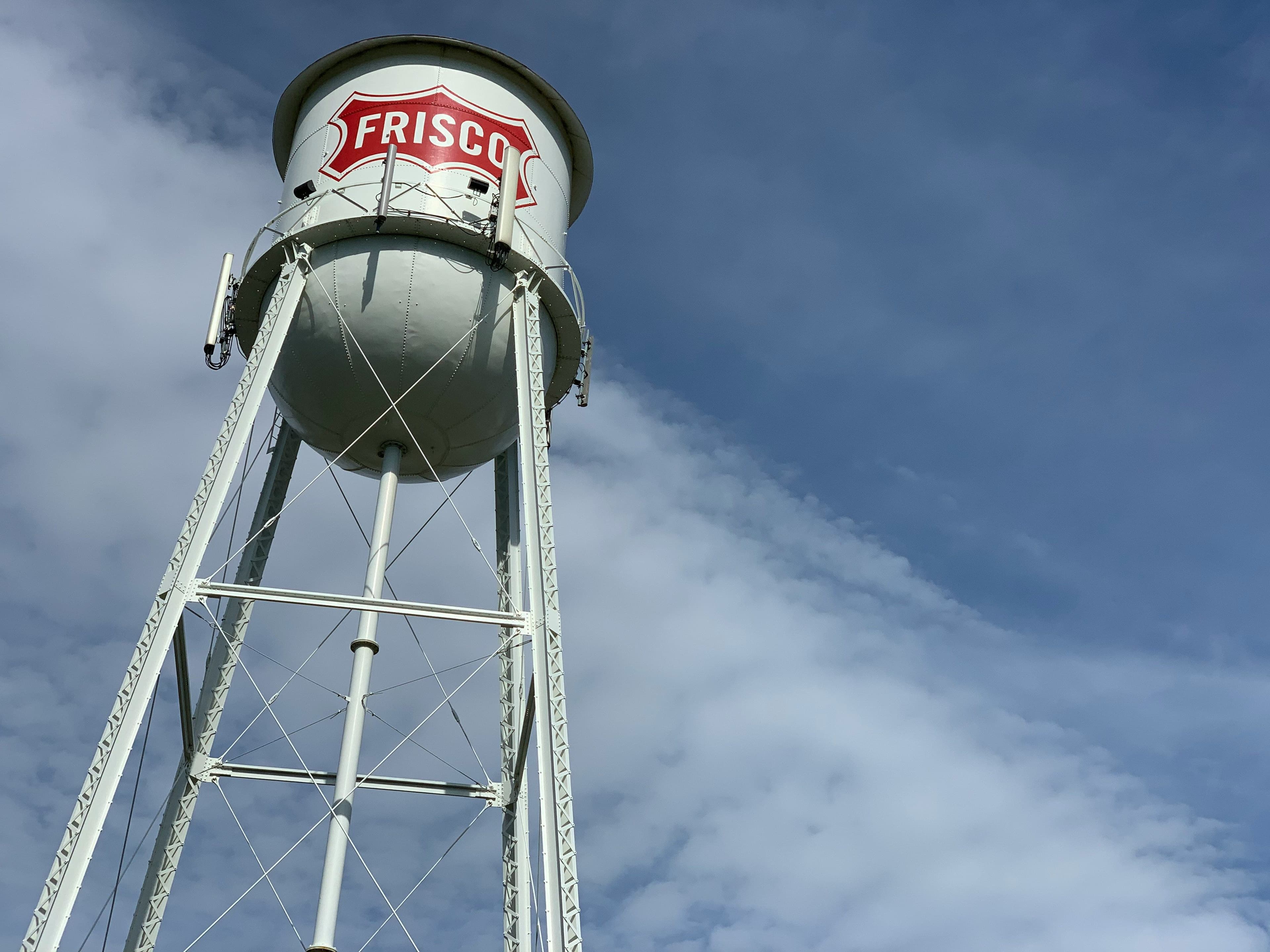 Frisco water tower standing on a clear summer day.